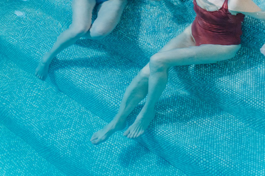 Two People in the Swimming Pool · Free Stock Photo