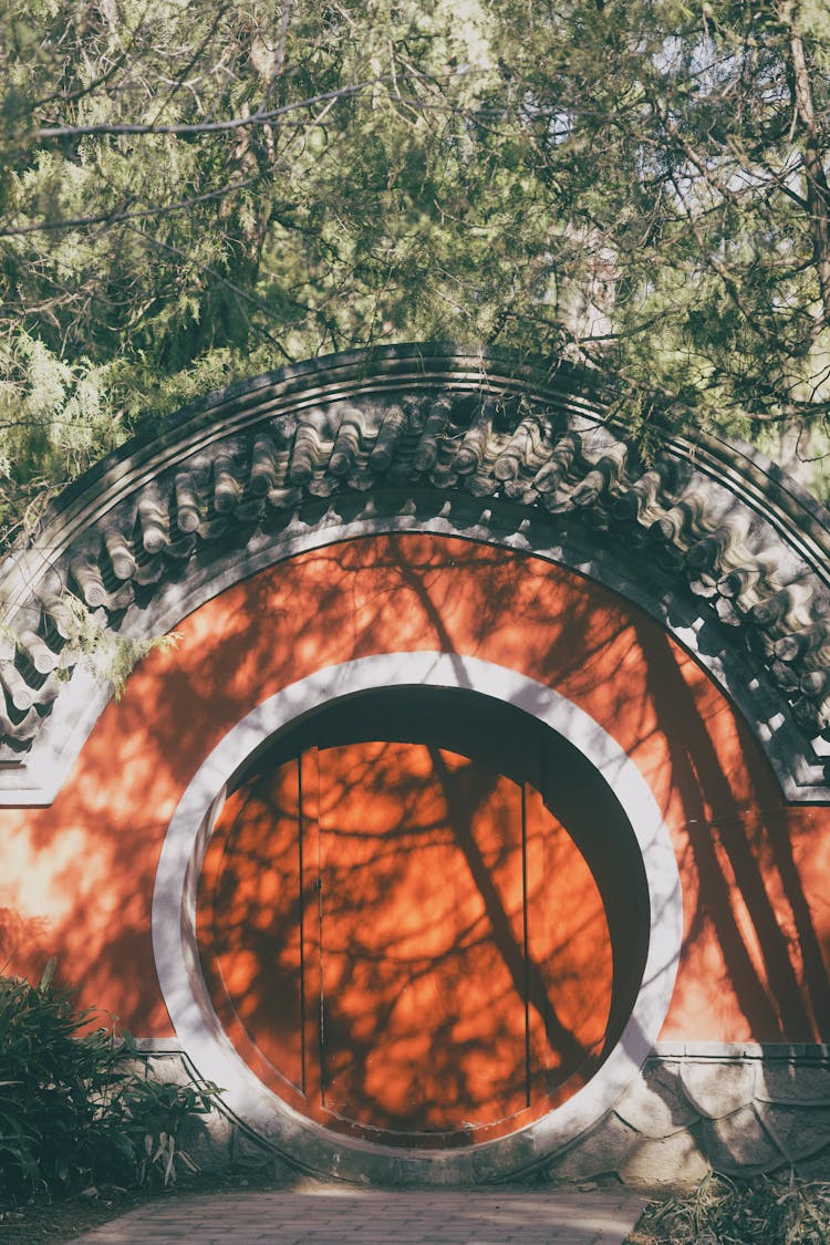 Circular Gate Into A Garden In China 