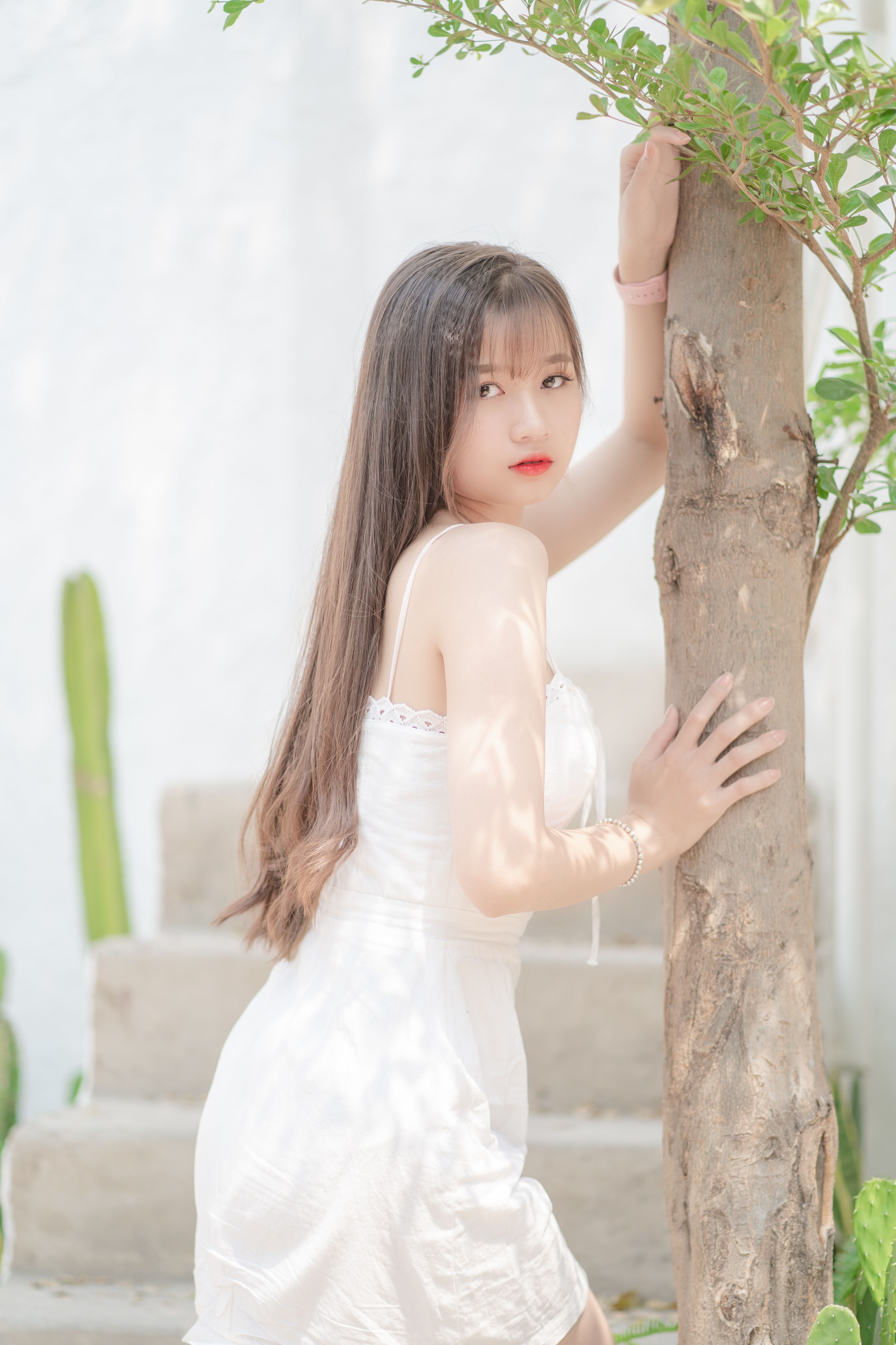 A Woman Posing wearing White Dress · Free Stock Photo