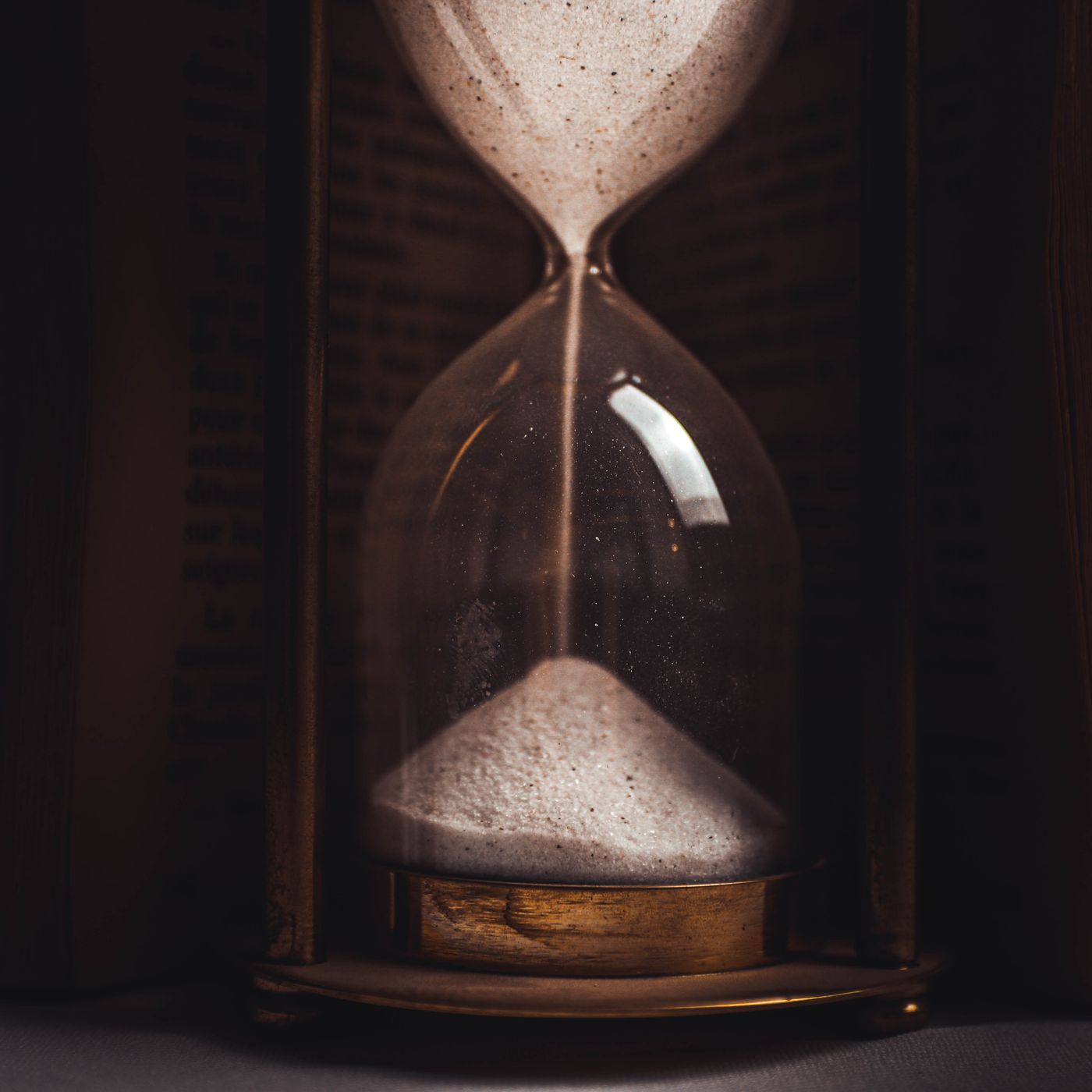 An hourglass with sand running through it