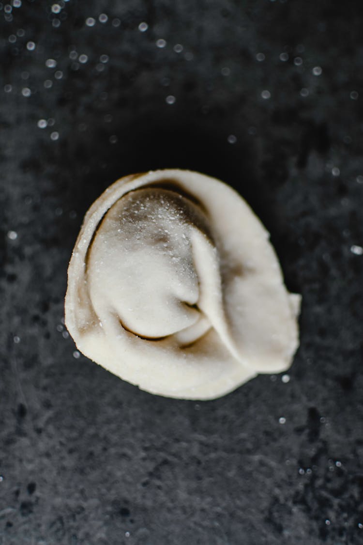 Dumpling Dough On Black Surface