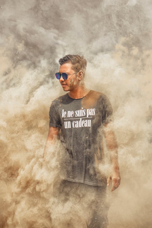 Man in Black Crew Neck T-shirt With White Smoke