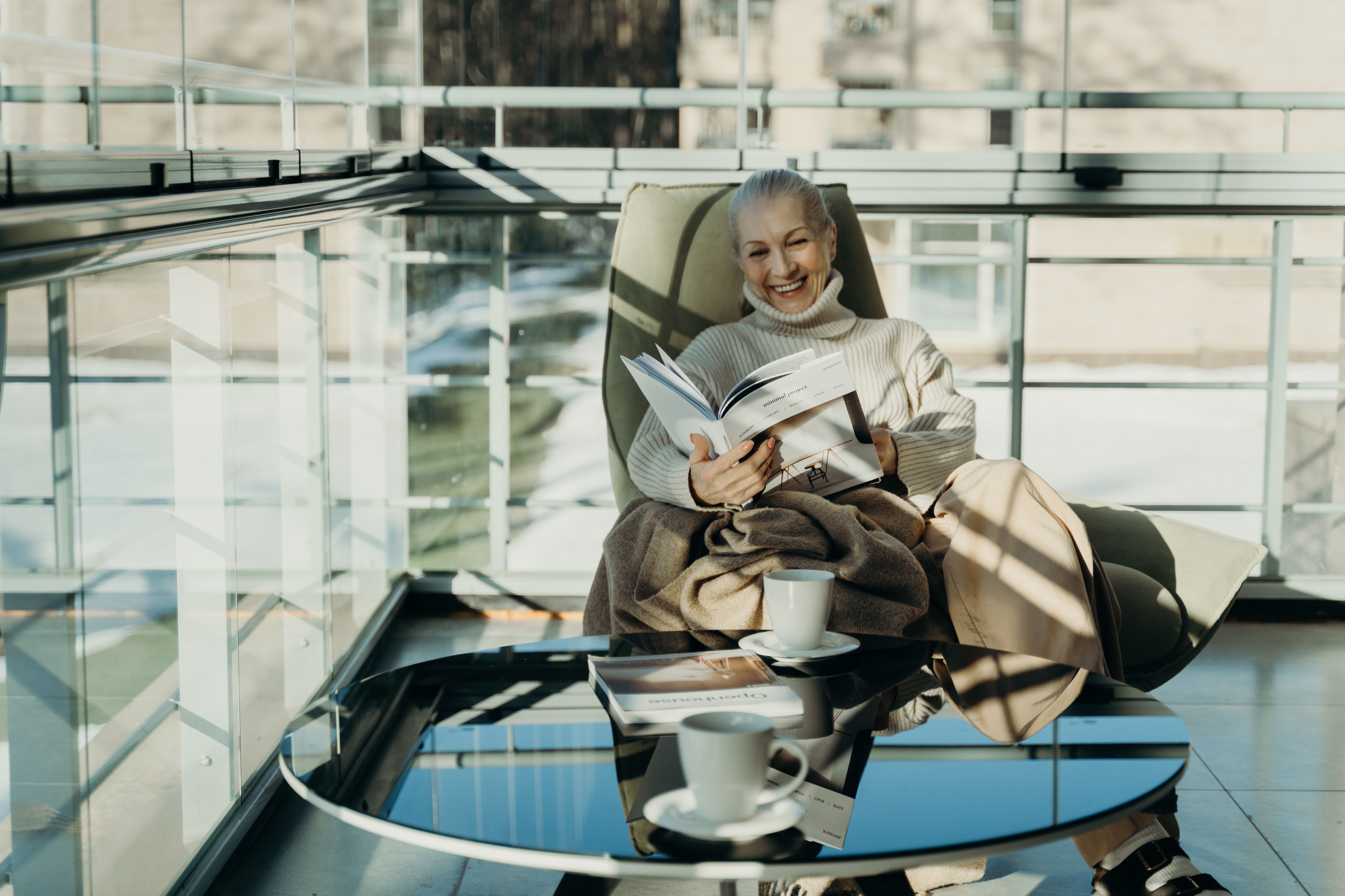 Senior woman reading in a bright, calm environment