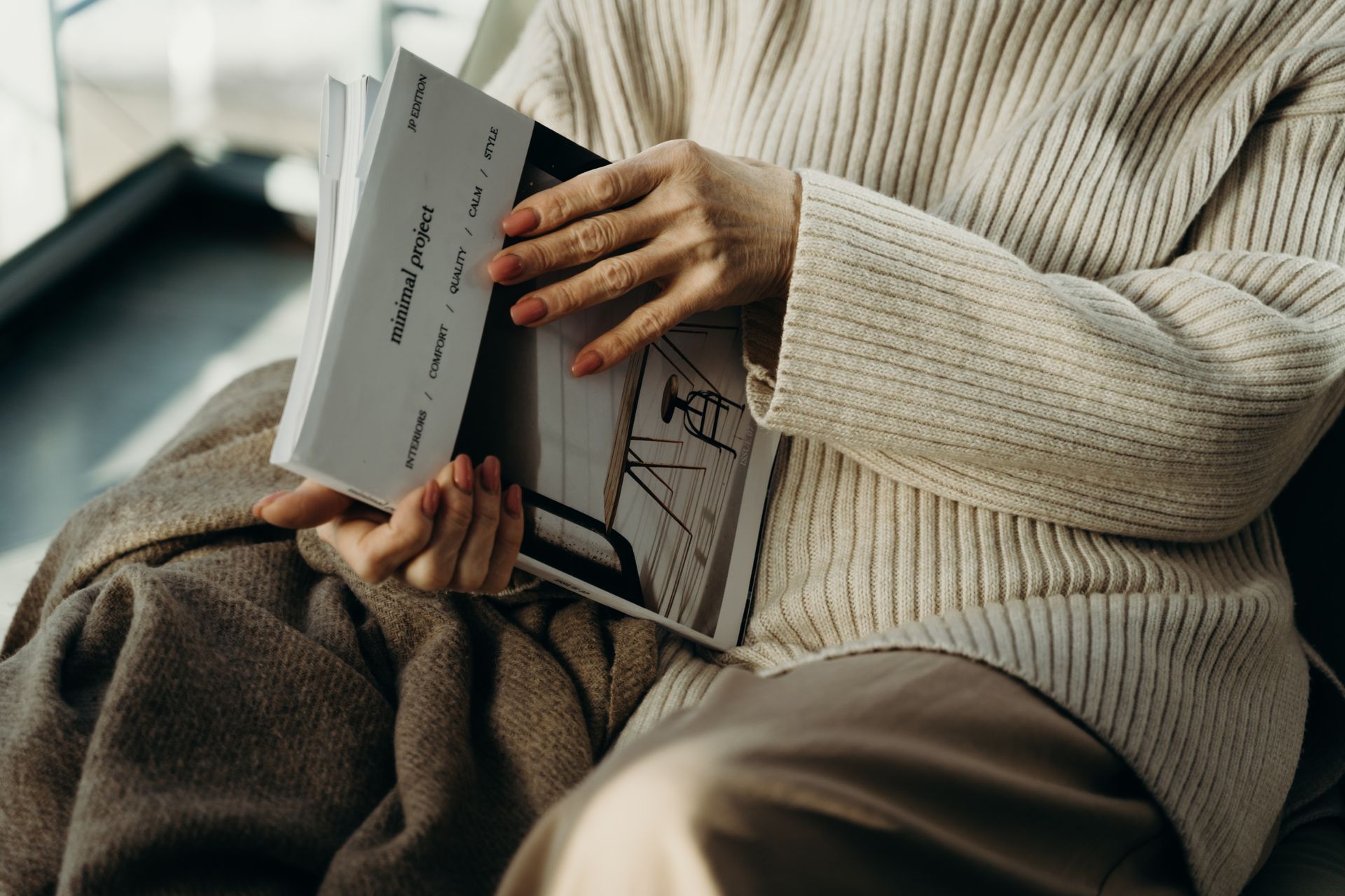 A Person Holding a Magazine