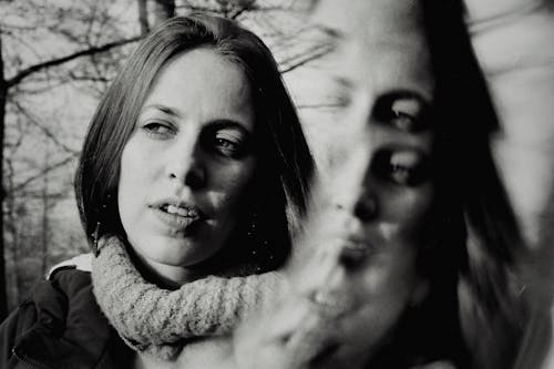 Free Grayscale Photo of a Woman with a Scarf Stock Photo