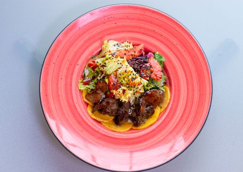 Appetizing Lunch Meal of Cooked Poultry Liver and Vegetable Salad