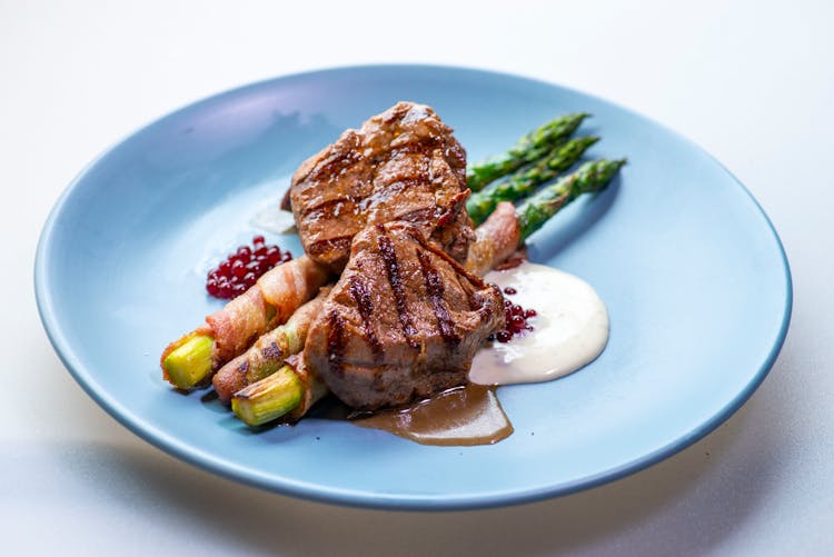 Steak With Asparagus And Sauce 