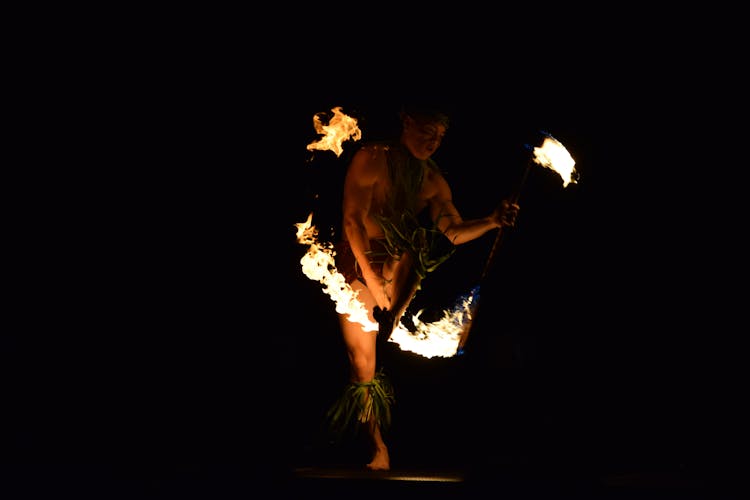 A Man In Hawaiian Traditional Fire Dance