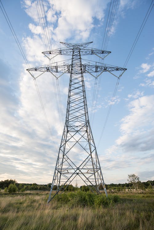 Low Angle Photo of Gray Transmission Tower