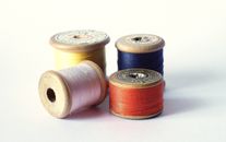 A Close-Up Shot of Reels of Thread