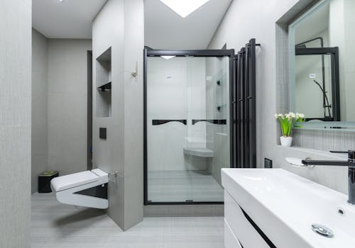 Bathroom with shower cabin and toilet