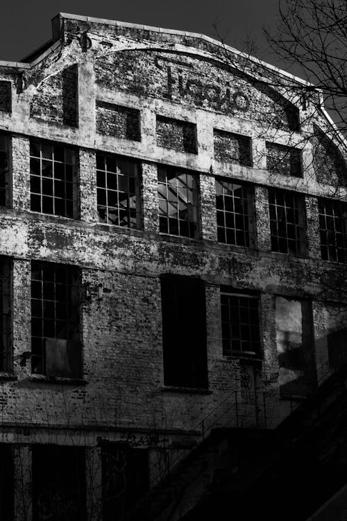 
A Grayscale of an Old Brick Building