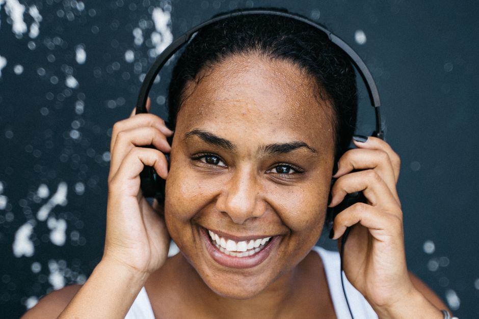 woman listening music clearly happy