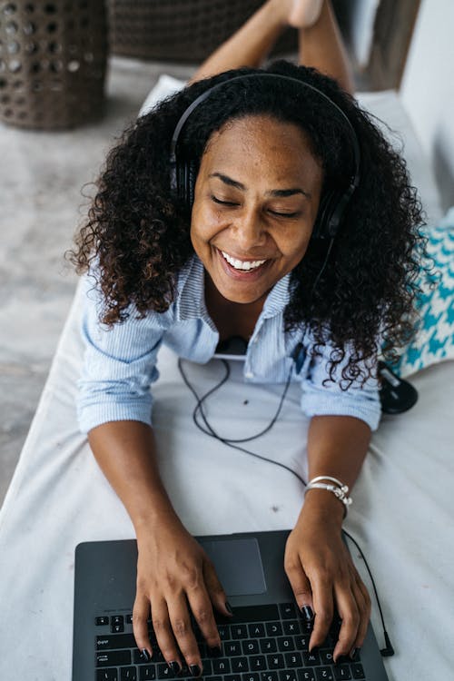 Woman with Headphones Over her Head