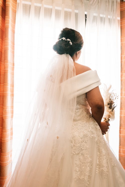 Free Back View of a Bride in a White Gown Stock Photo