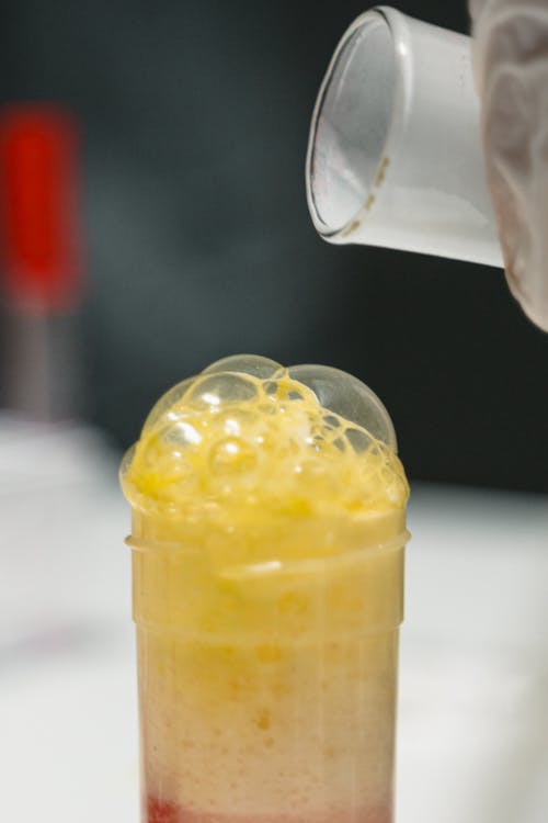 Yellow Liquid in Clear Drinking Glass