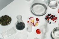 Assortment of Pills on White Surface