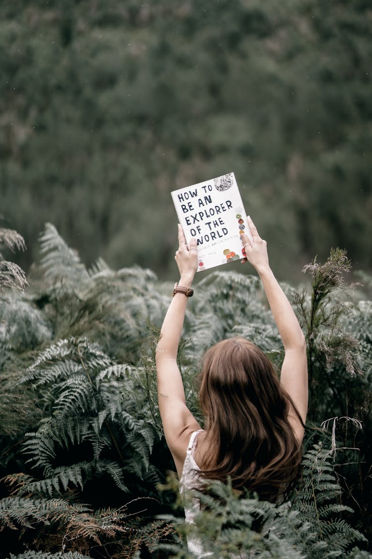 Woman Holding A Book