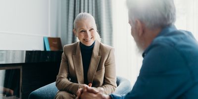Smiling elderly woman radiating warmth and joy