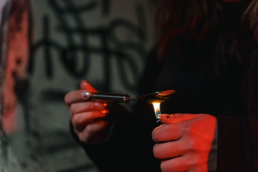 Close-Up Shot of a Person Lighting Silver Spoon 