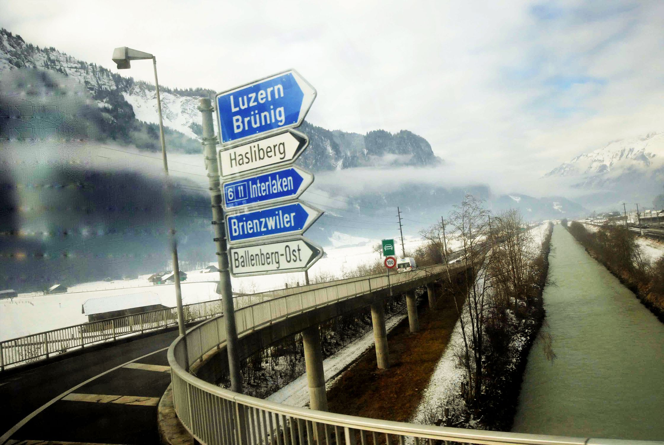 Road Sign Post Under the Cloudy Sky · Free Stock Photo