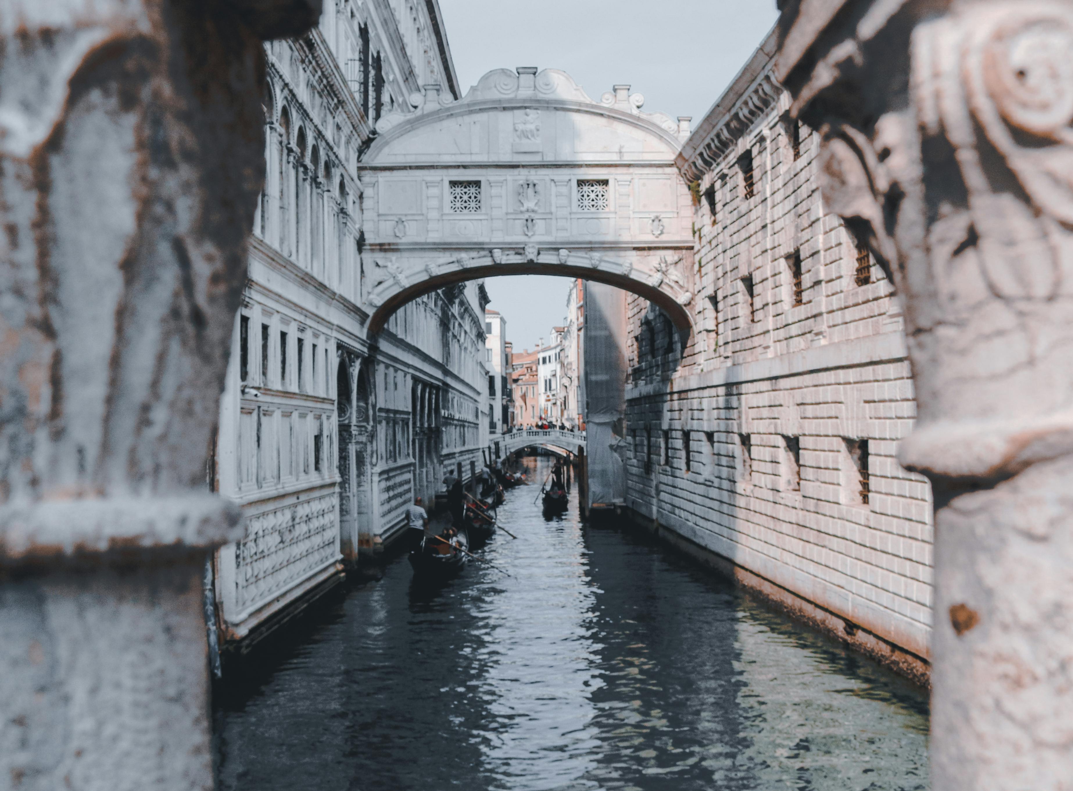 Person reading entertainment news on a tablet with a neutral expression