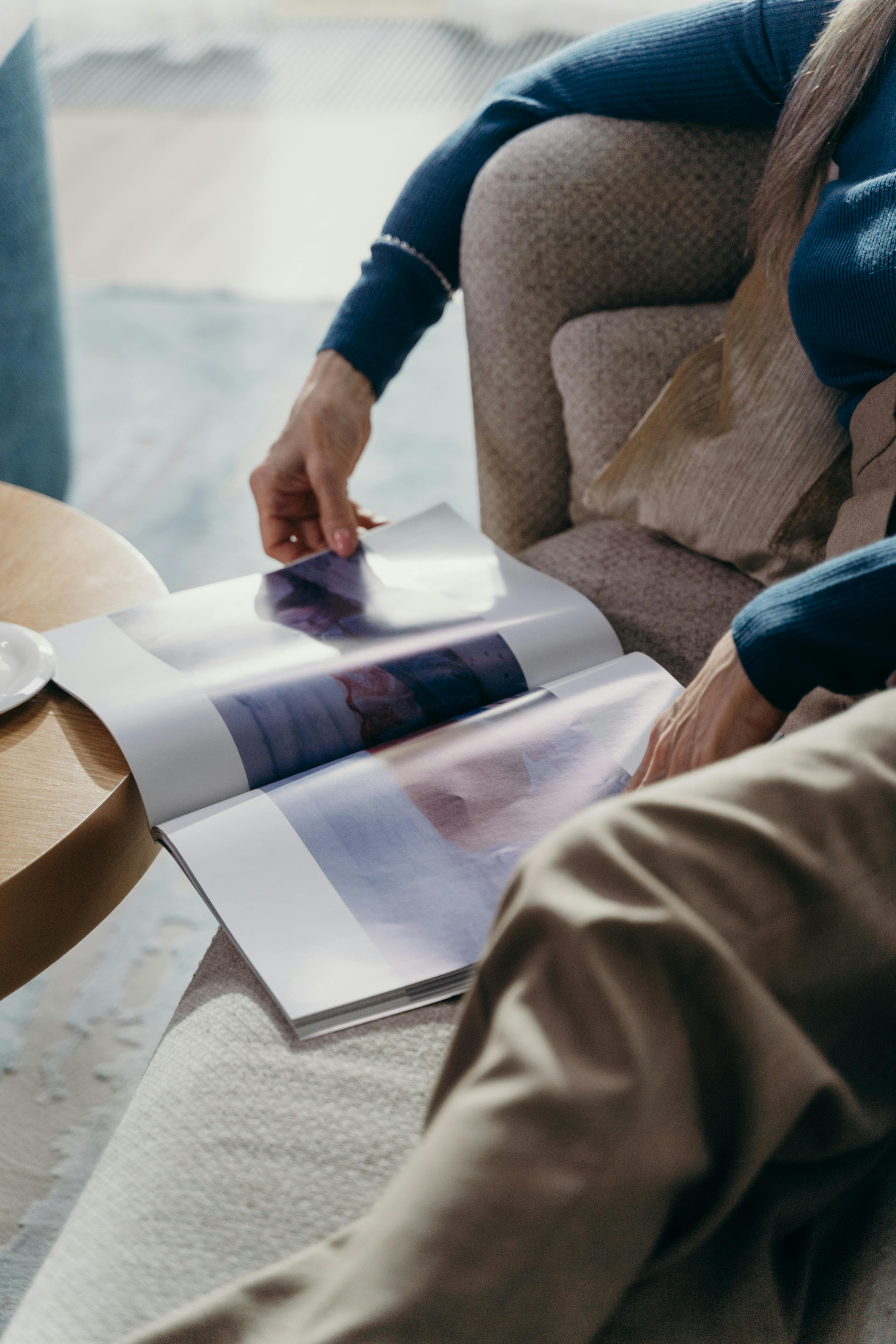 A Person Reading a Magazine · Free Stock Photo