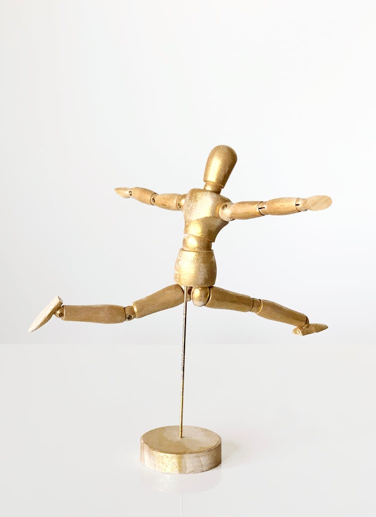 A Human Figure On Stick