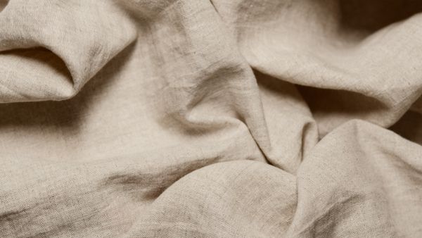 Beige cotton fabric with natural texture and crumples — Artem Podrez on Pexels