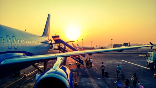 Photography of Airplane during Sunrise