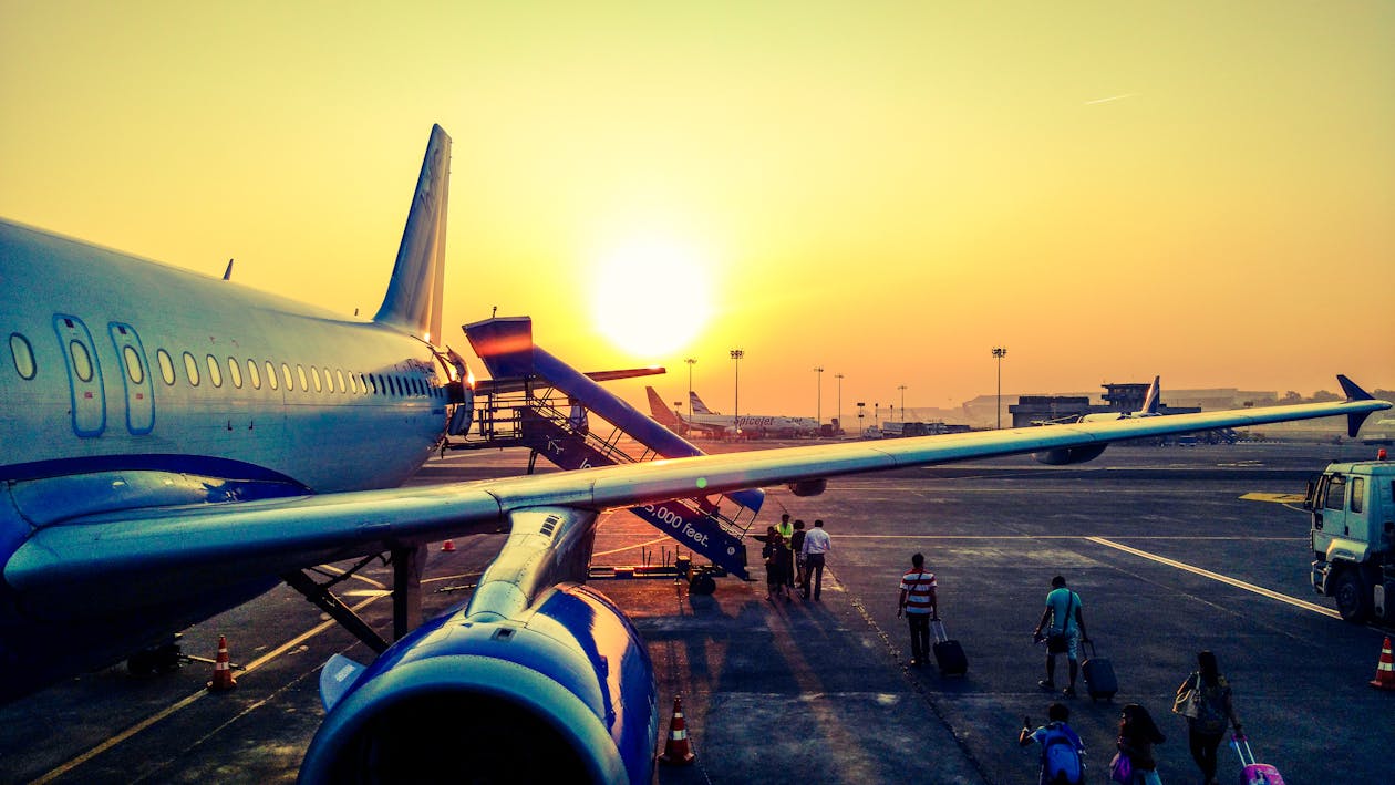 Photography of Airplane during Sunrise