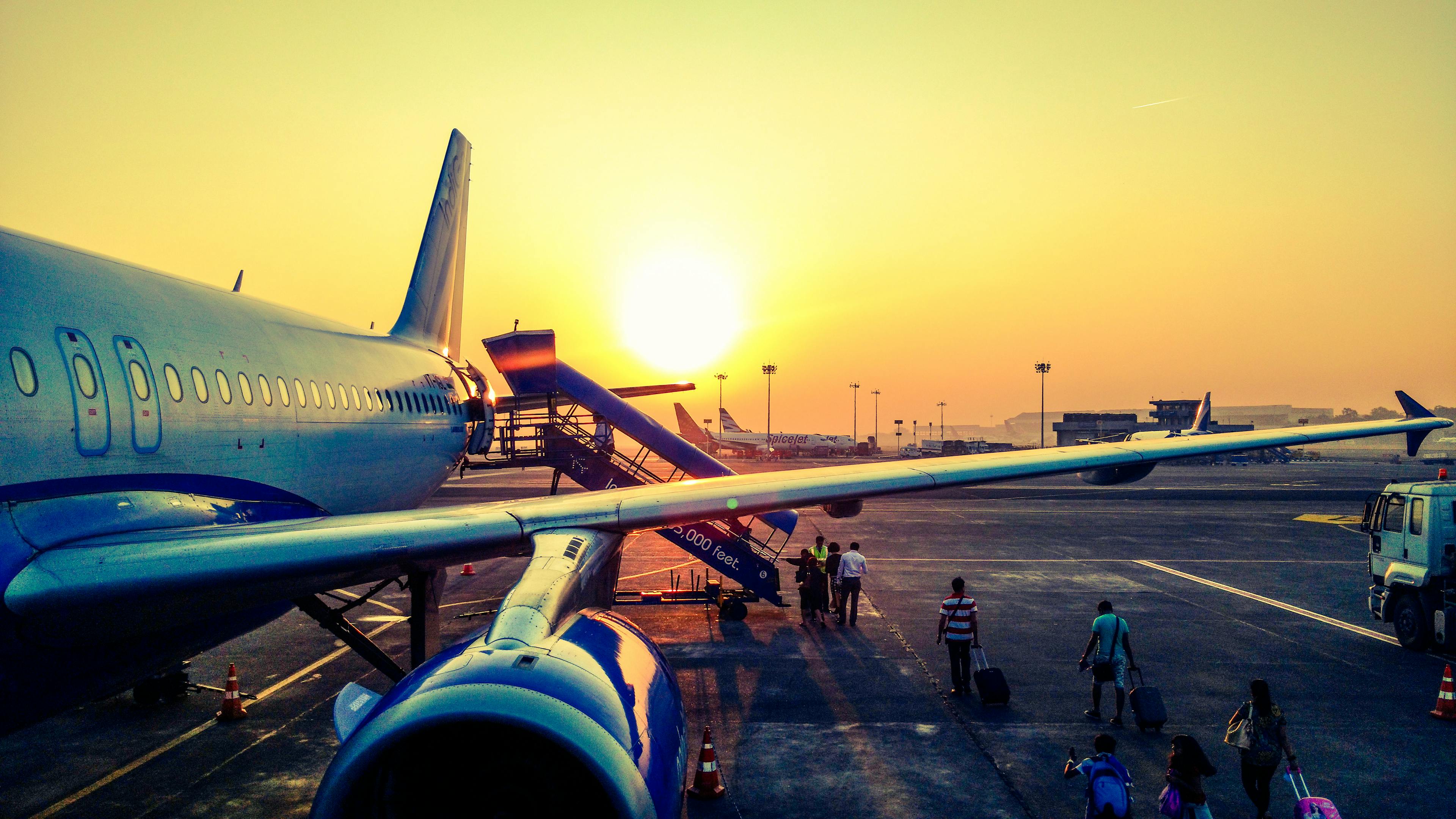 Photography of Airplane during Sunrise