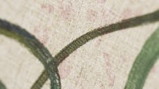 Close-Up Shot of a Beige Textile