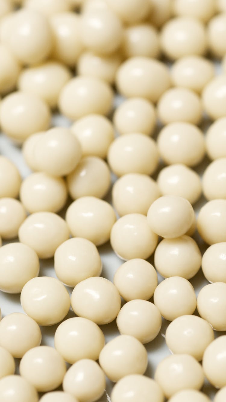 White Round Bubble Gums In Close-up Shot
