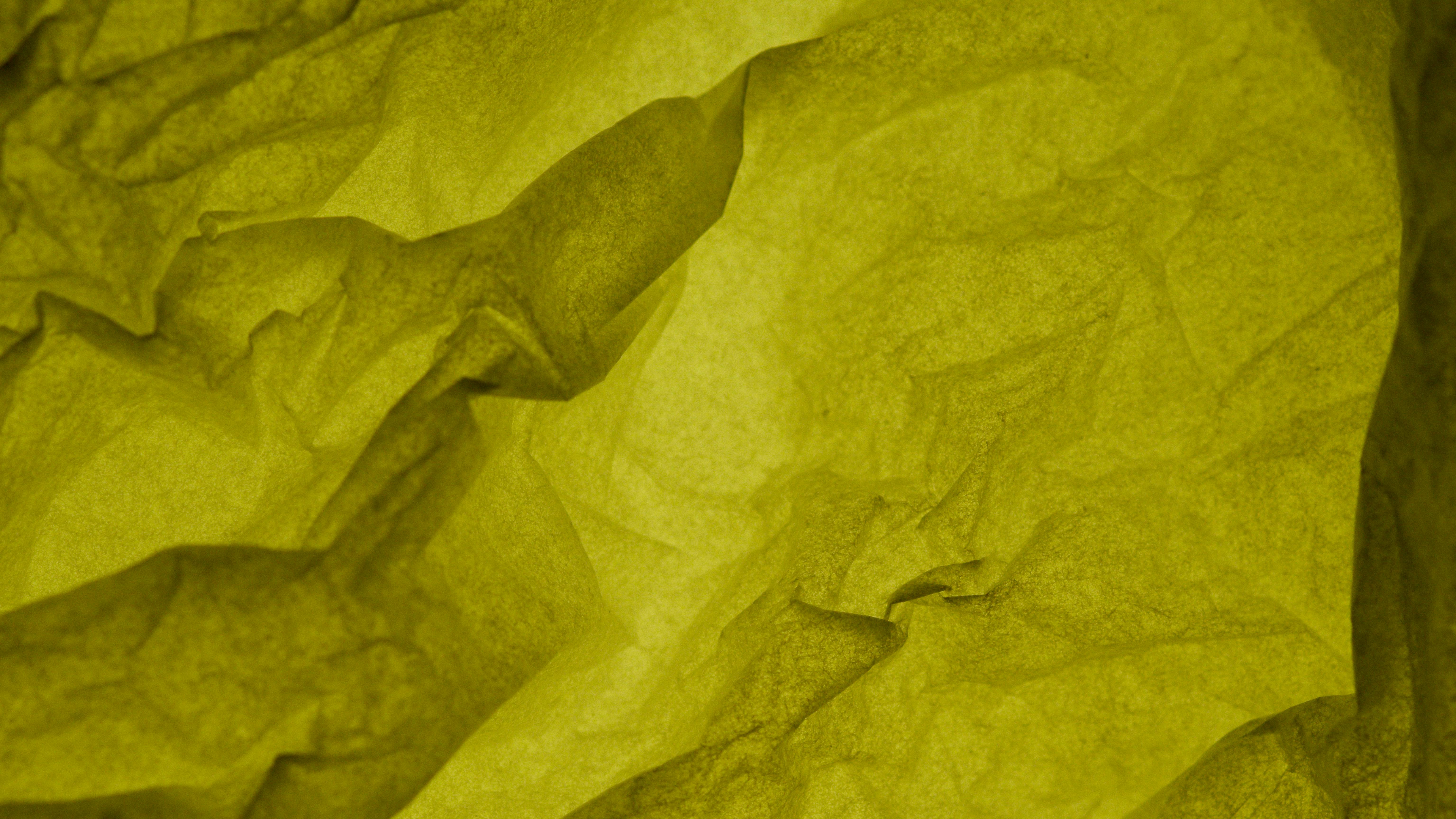 Premium Photo, Close-up crumpled yellow paper background