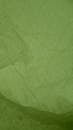 Green Textile on Brown Wooden Table