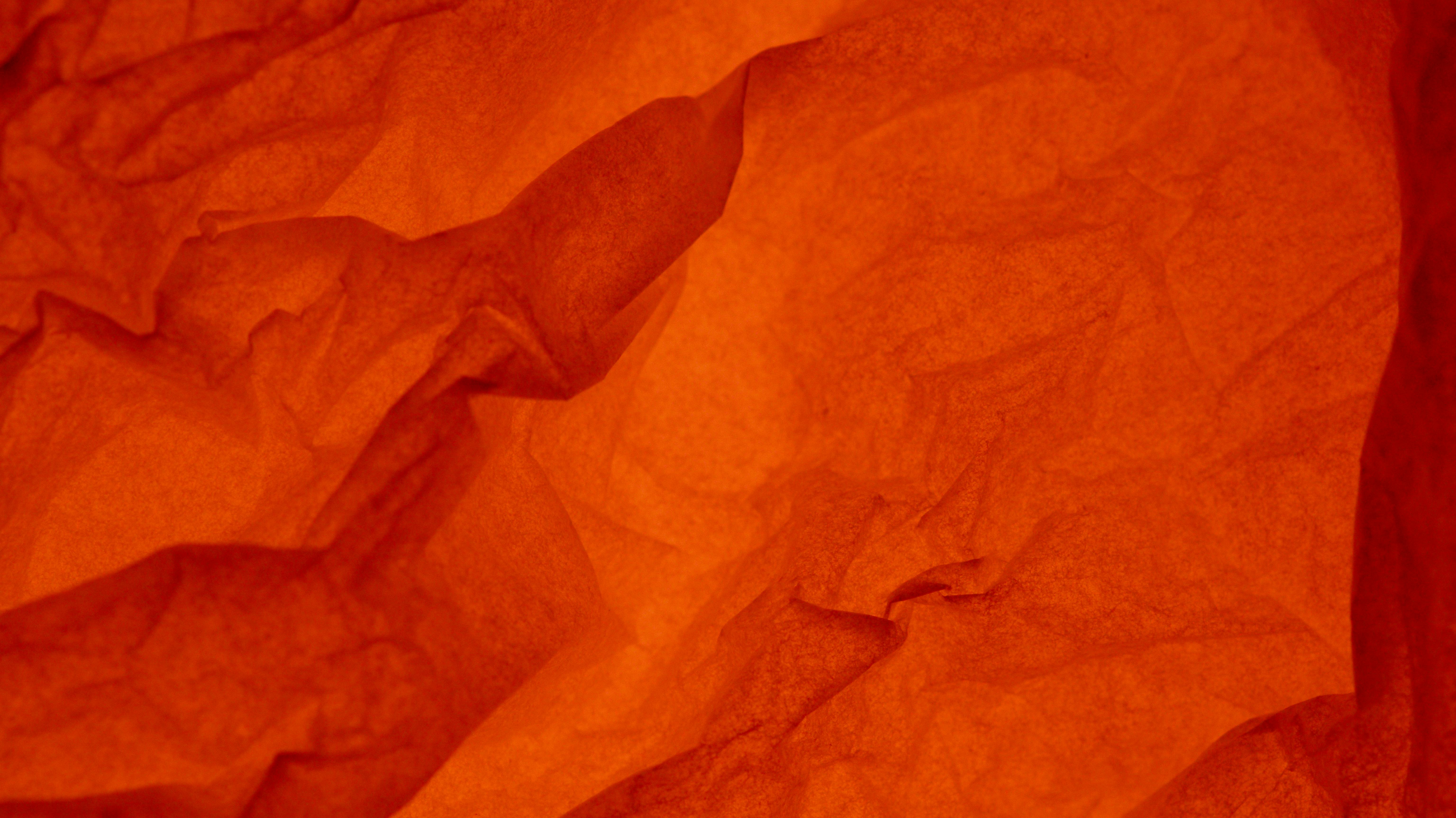 photograph of red crumpled paper