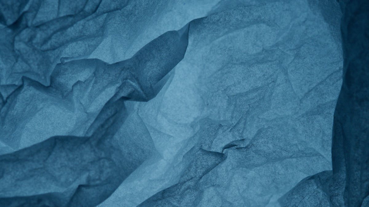 Close-Up Photo of Wrinkled Parchment Paper
