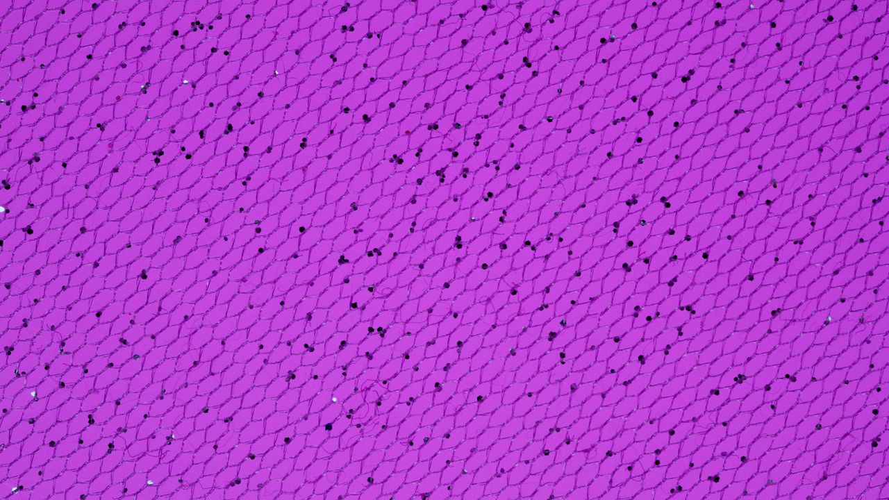 vibrant purple background with an abstract pattern ideal for textures