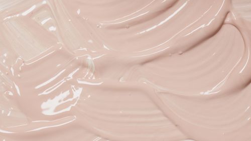 Free Abstract close-up of textured pink paint swirls, ideal for backgrounds and art projects. Stock Photo