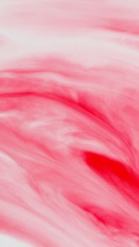 Vibrant abstract watercolor art in shades of red and pink, perfect for creative projects.