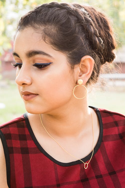 A Woman in Red and Black Plaid Dress