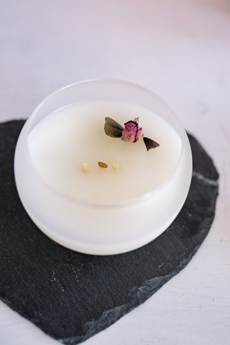 Dried Flower And Leaves On A Candle