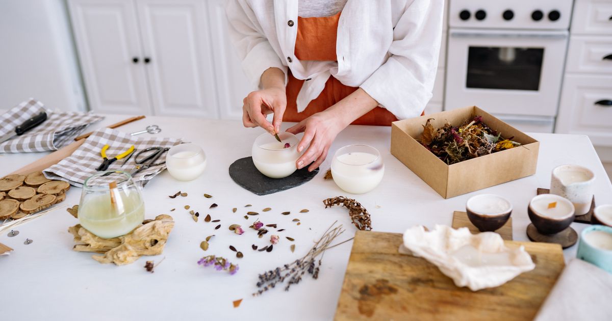 Person making artisan candles