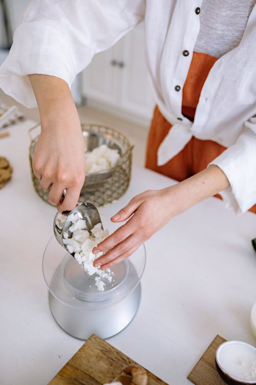 Person Making Candle