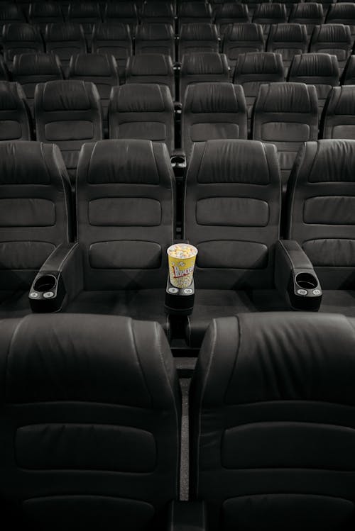 Free Lined Up Black Leather Cinema Seats Stock Photo