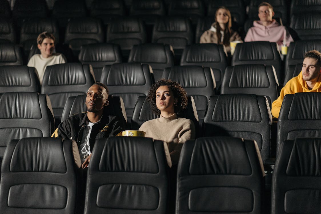 People Watching a Movie at the Cinema