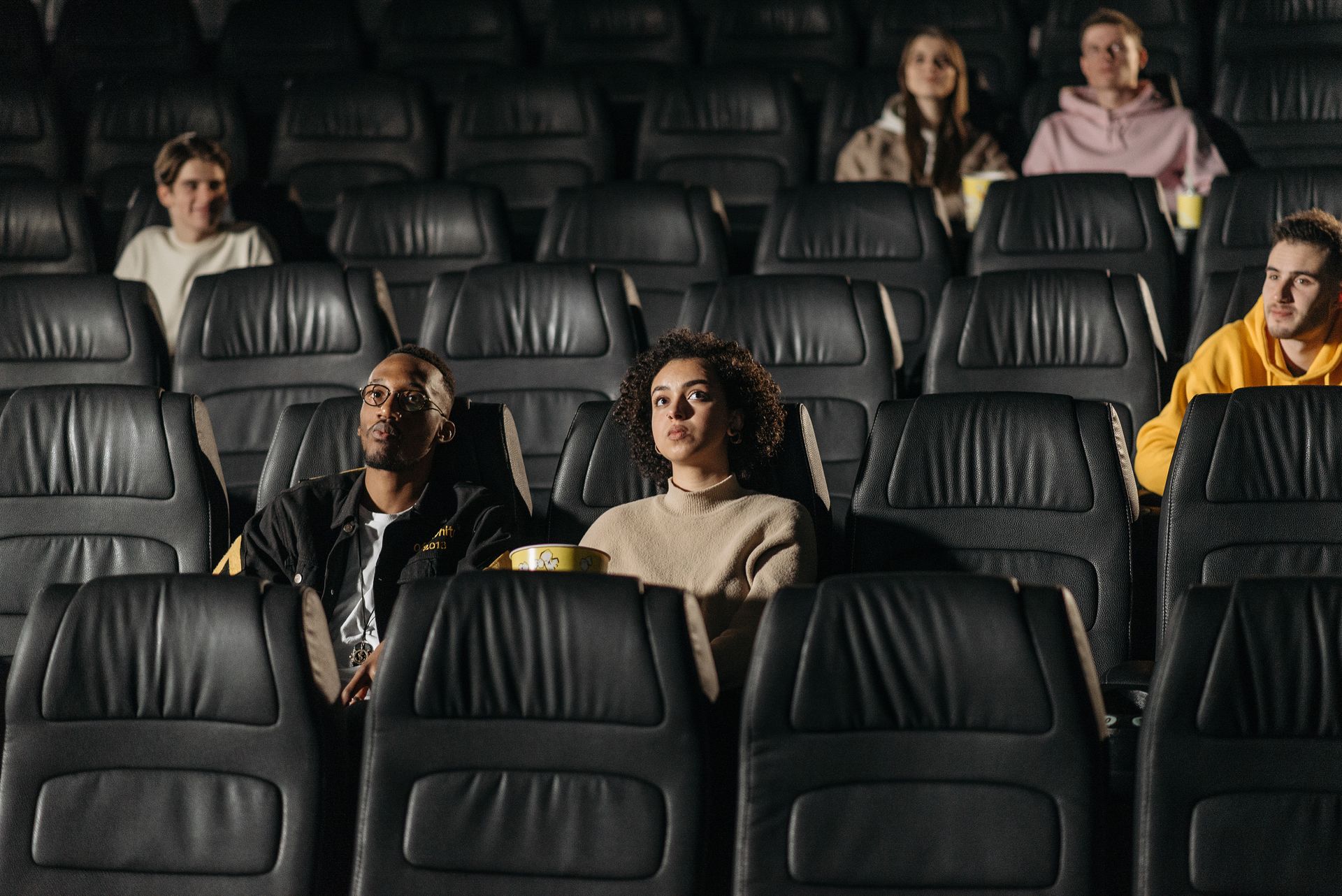 People Watching a Movie at the Cinema