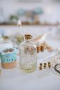 A Variety of Clear Glass Bottles with Cork Stoppers
