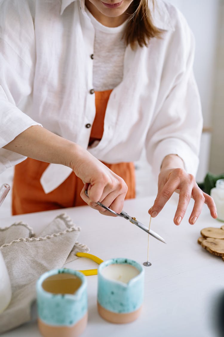 Person Cutting A String